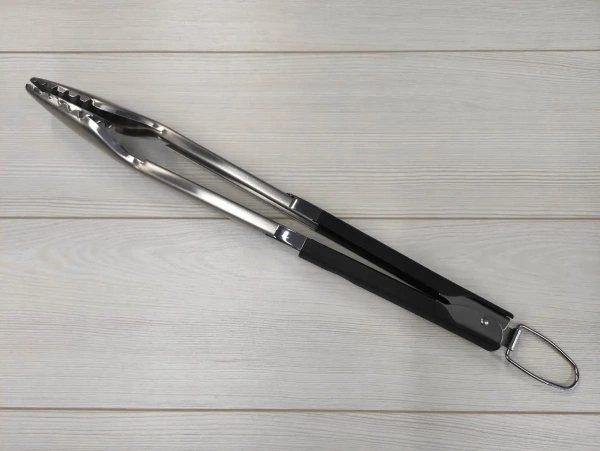 Щипцы из нерж. стали 44см., с фиксатором